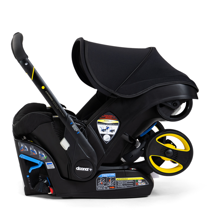 Doona Infant Car Seat + Base + Essentials Bag - Midnight Edition