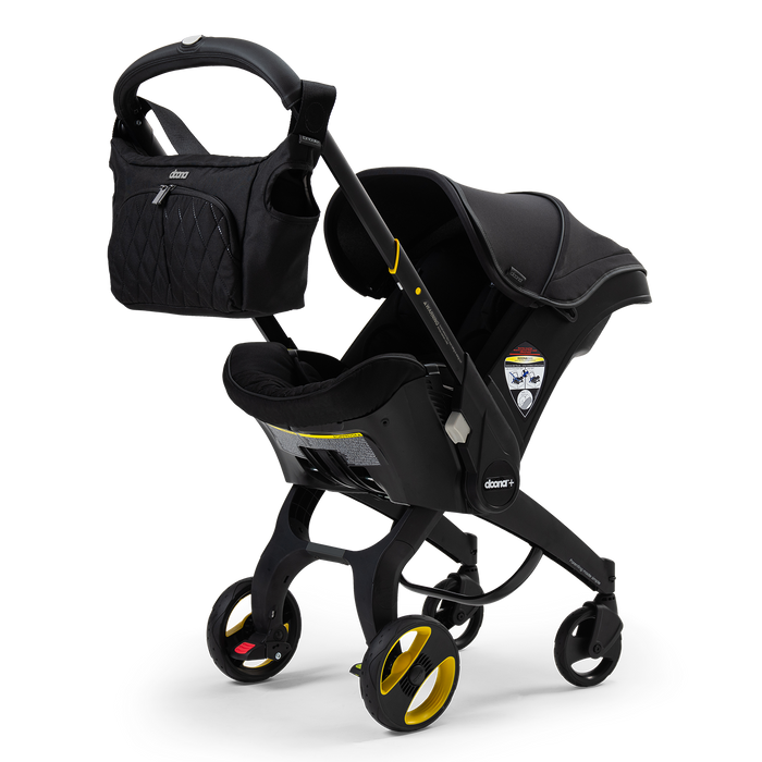 Doona Infant Car Seat + Base + Essentials Bag - Midnight Edition