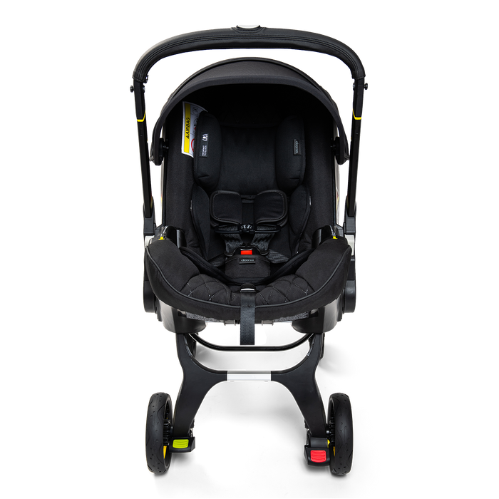 Doona Infant Car Seat + Base + Essentials Bag - Midnight Edition